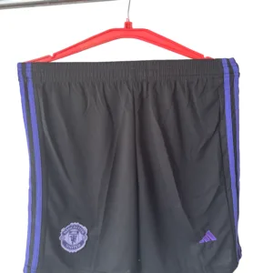 mufc purple shorts