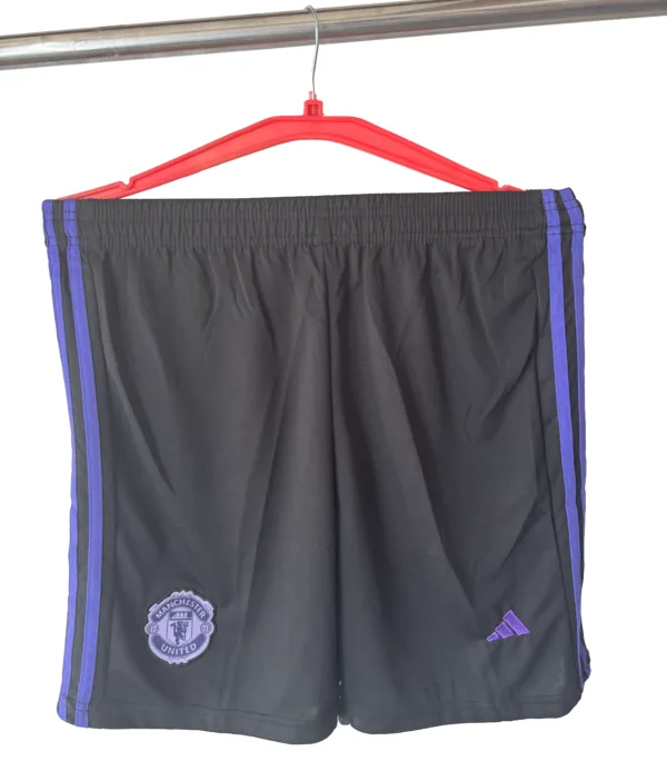 mufc purple shorts